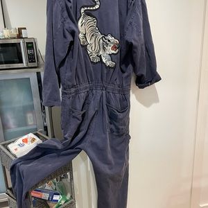 Distressed mechanic like jumpsuit.